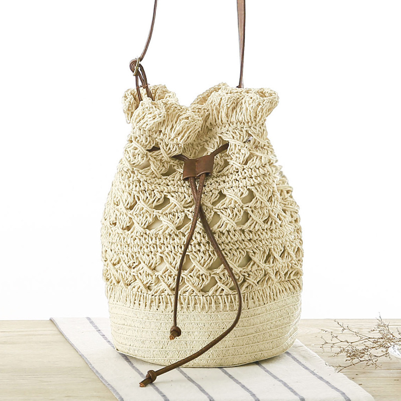 New Hollow Bucket Woven Bag Shoulder Beach Bag Seaside Vacation Straw Bag Female Bag Beige - Shop at LoveMi