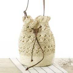 New Hollow Bucket Woven Bag Shoulder Beach Bag Seaside Vacation Straw Bag Female Bag - Beige - View 1