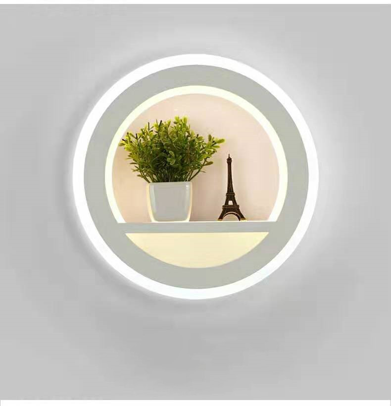 Compact Eiffel LED wall decor with small green plant