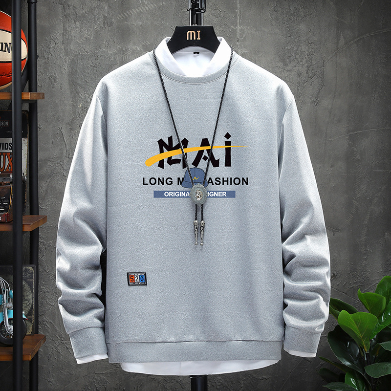 A Loose Hoodie With A Round Neck And Long Sleeves