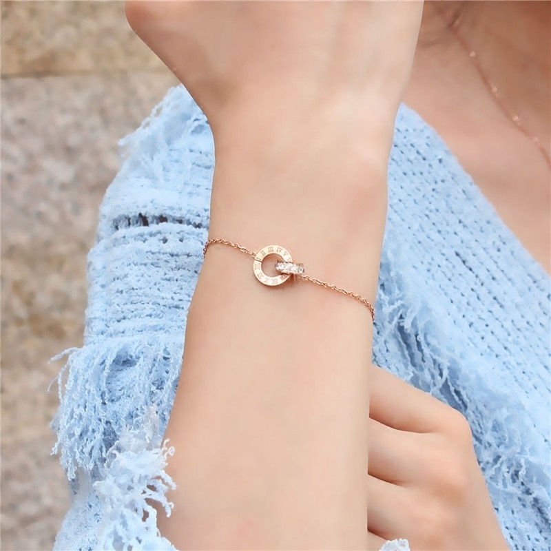 Rose Gold Bracelet With Diamonds And Roman Numerals