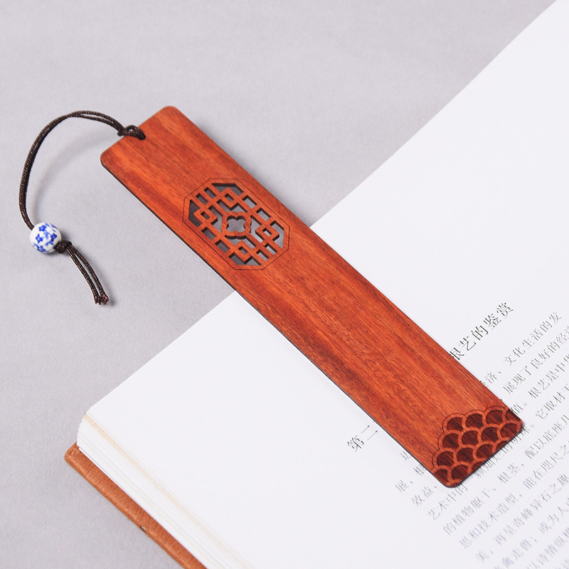 Four styles of wooden bookmarks showing different wood types and grain patterns