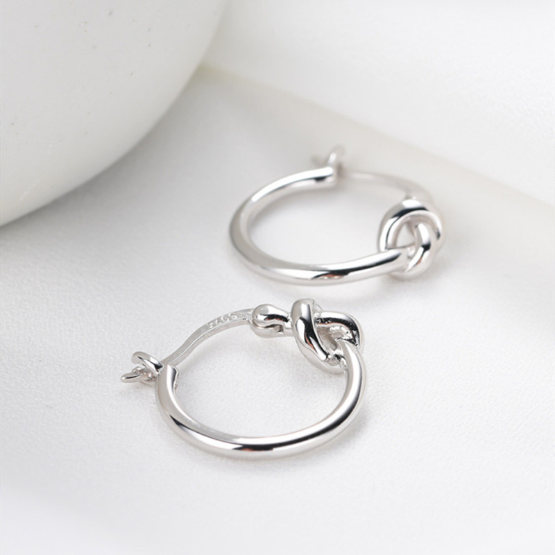 Autumn and winter new simple metal wind knotted ring circle earrings ear buckle female ear