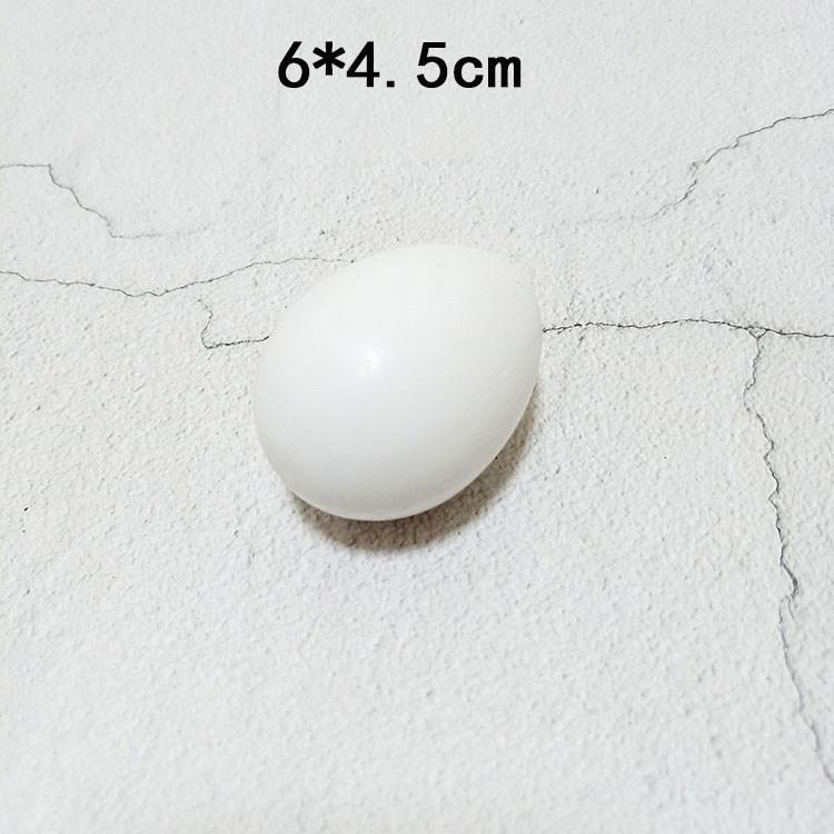 White wooden egg