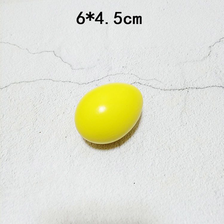 Yellow wooden egg