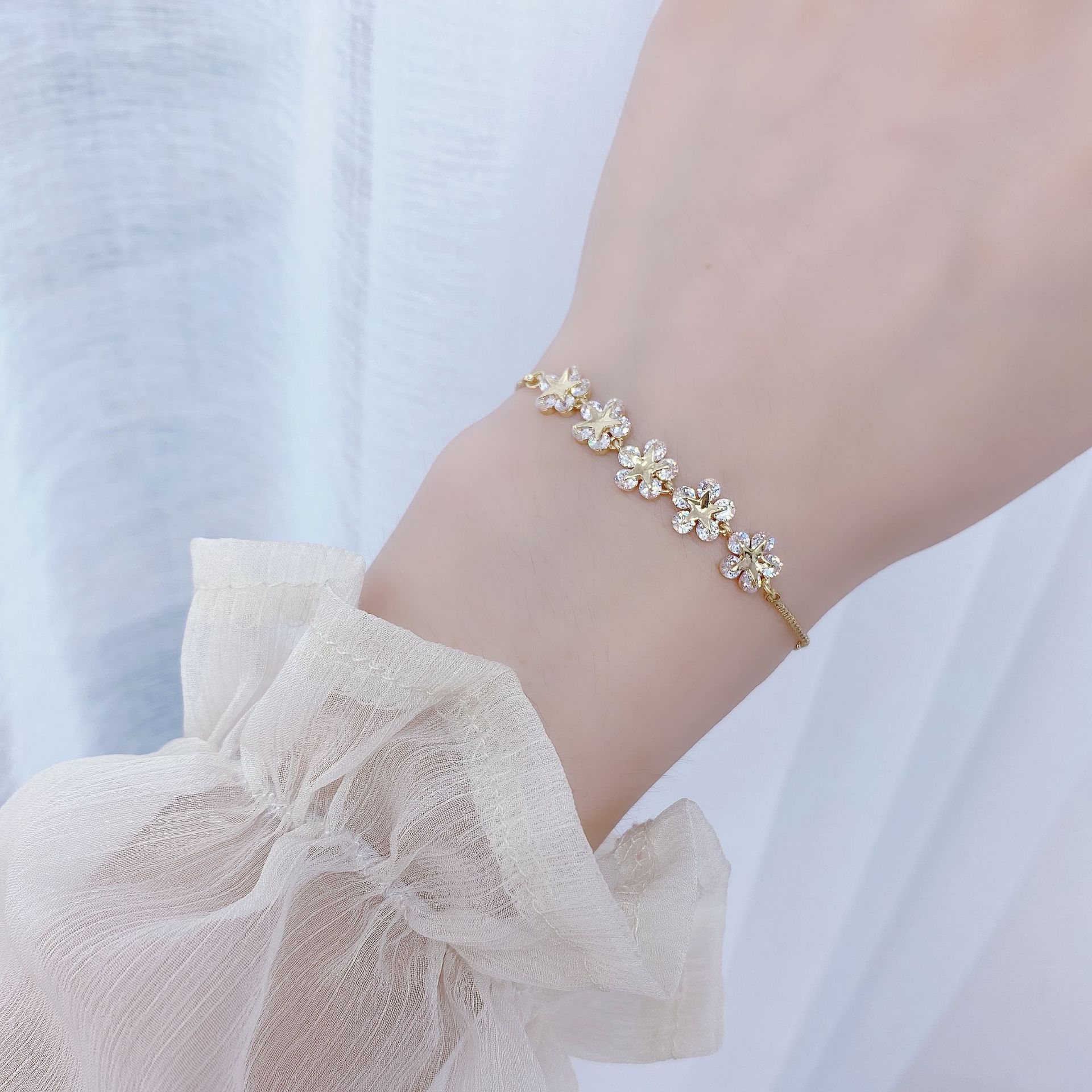 Exquisite 14k Gold-Plated Flowers Micro-Inlaid Zircon Snake Bone Chain Simple Adjustment Bracelet