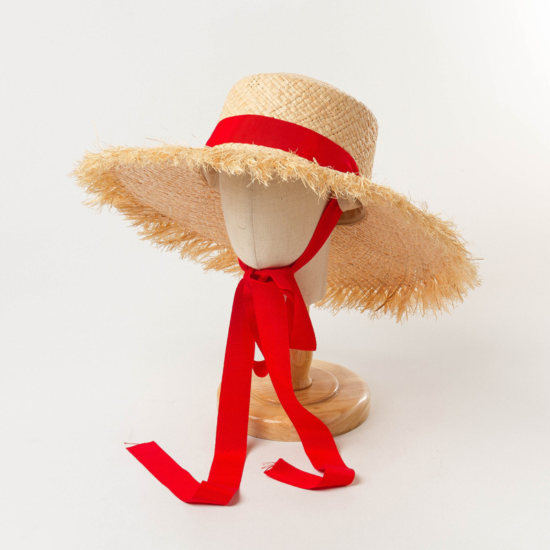 Hand-Knitted Raffia Straw Hat With Frayed Edge