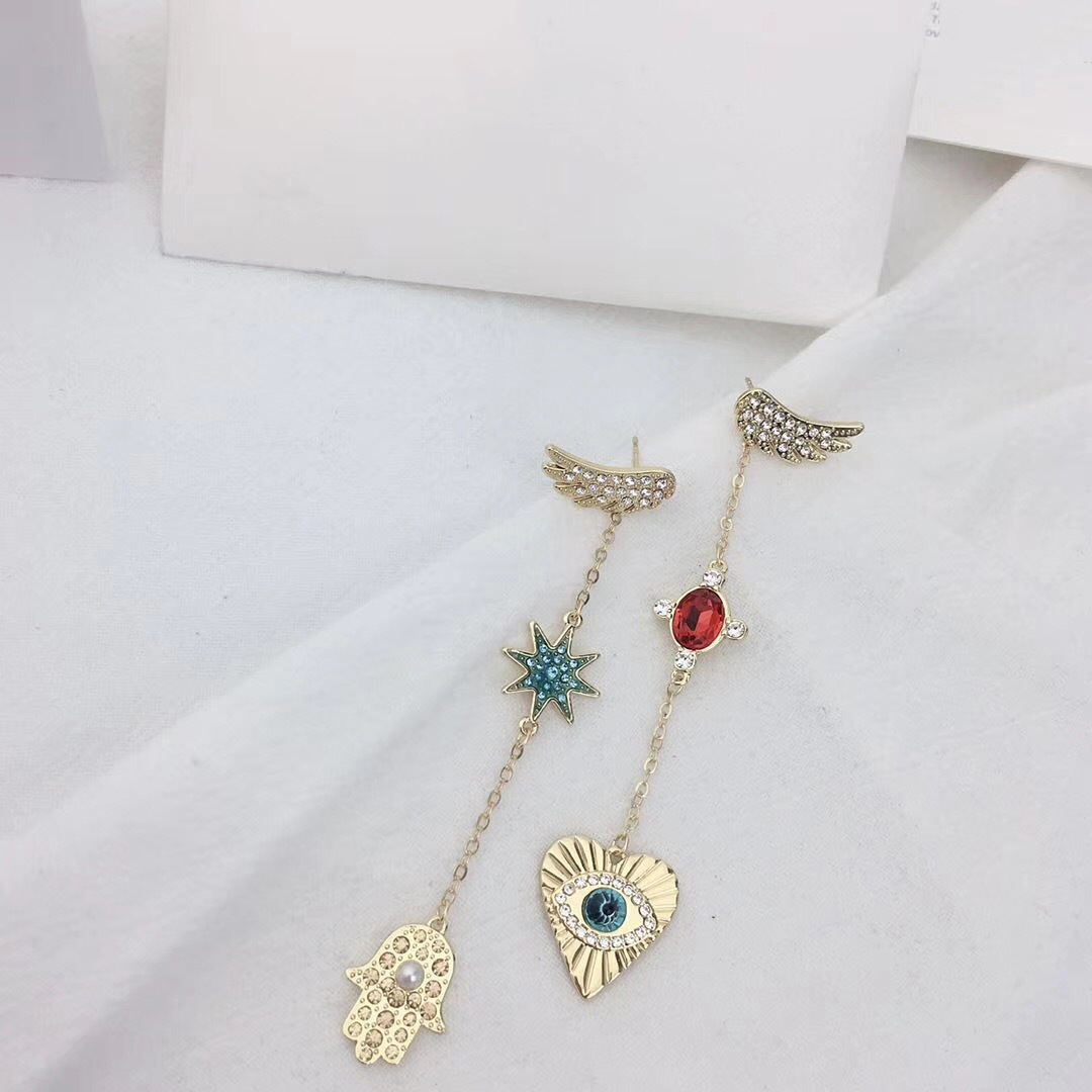 Lucky Element Heart-Shaped Magic Eye Stud Earrings Asymmetrical Golden Palm Tassel Earrings