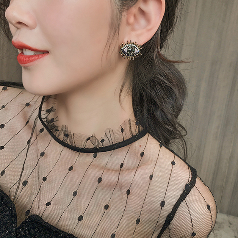 S925 Silver Needle Personality Retro Angel Eye Net Red Earrings