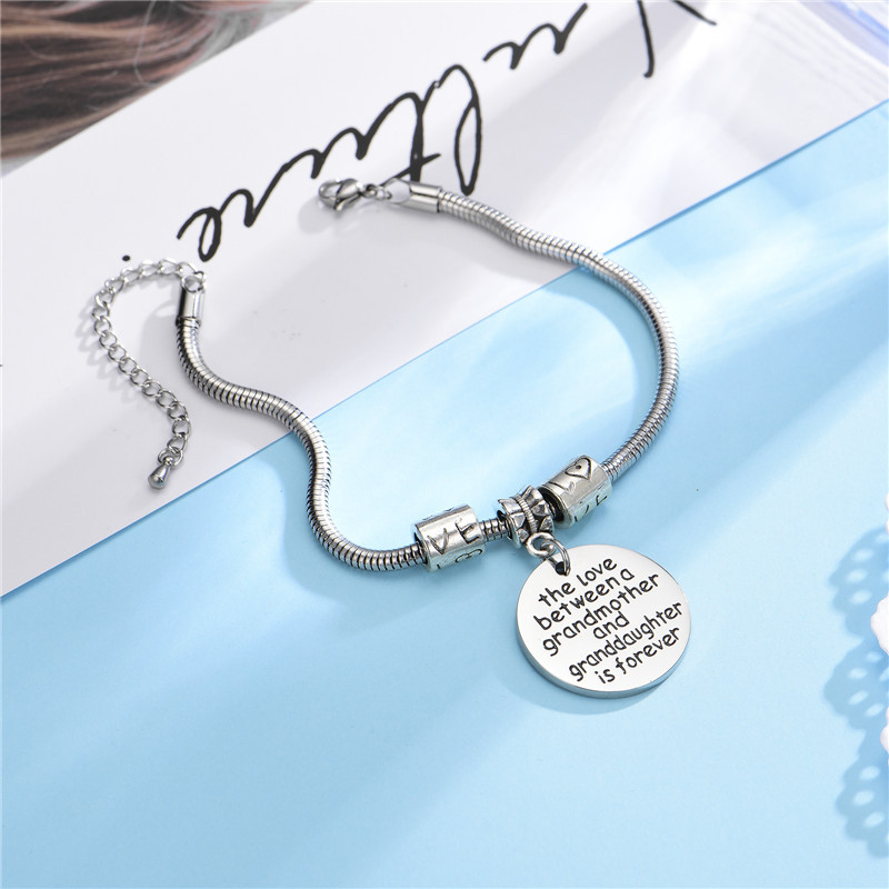 Titanium Steel Round Medal Bracelet With Lettering Round Brand Affection Bracelet