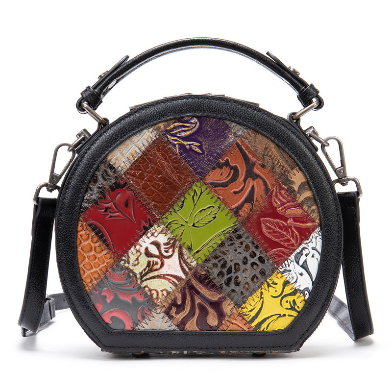 "Front view of a Vintage Patchwork Leather Mini Handbag, featuring a colorful geometric pattern with various textures and designs, a sturdy black handle, and detachable shoulder strap."