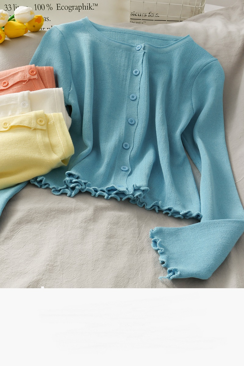 Small Girl In Blouse Looks Thin And Sunscreen Knitted Cardigan With Wooden Ears