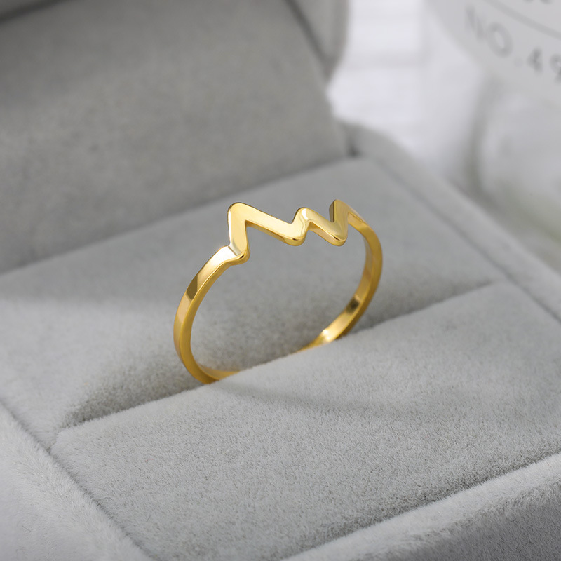 خاتم نسائي من الفولاذ المقاوم للصدأ بتصميم تخطيط القلب الكهربائي