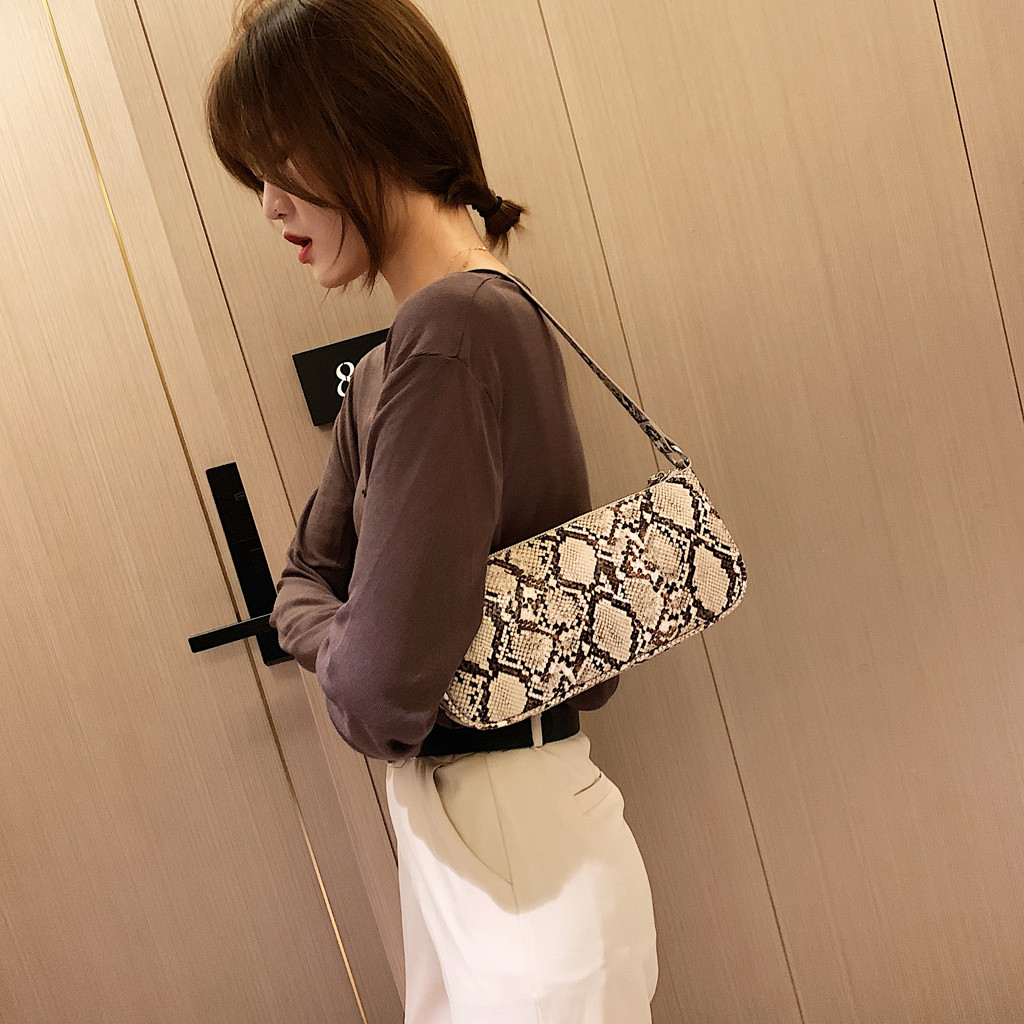 Title 4, Snake print female bag baguette