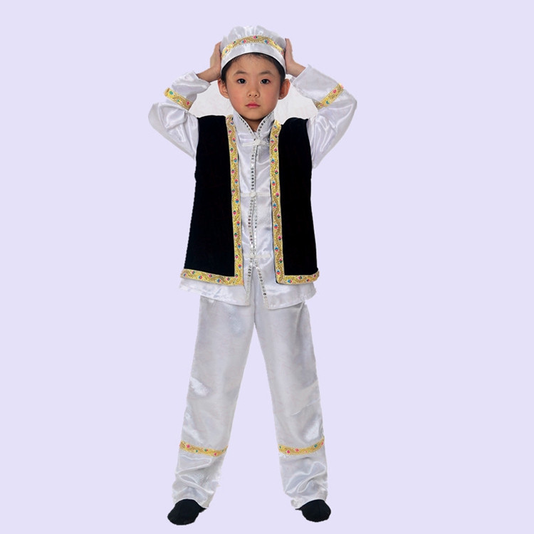 Ethnic Hui And Tibetan Boys Perform Xinjiang Dance In Tibetan Clothes On Festival Stage Performances