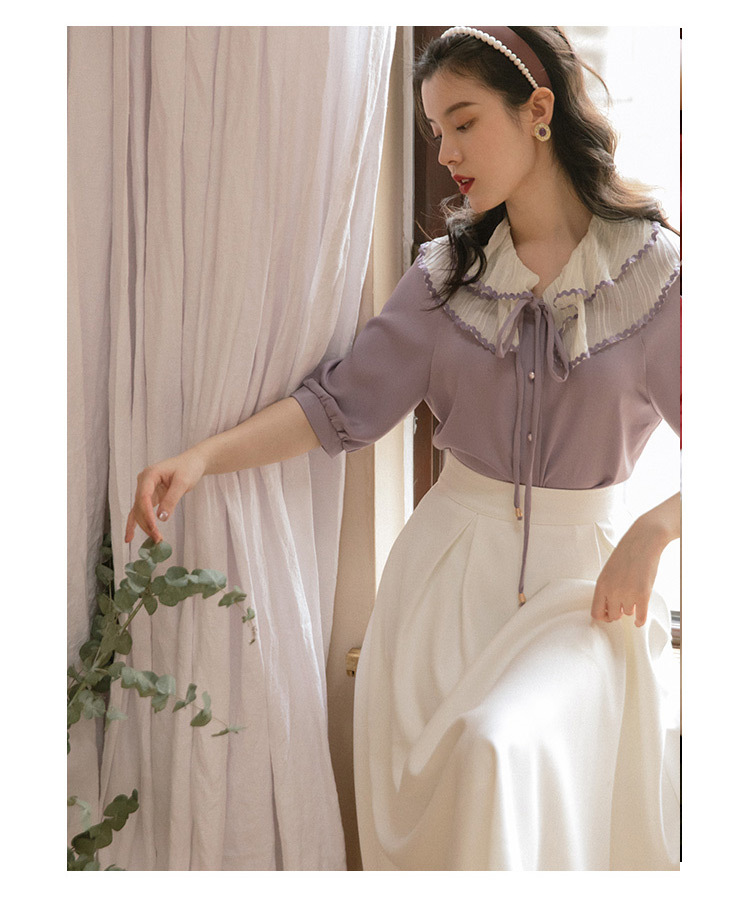 Two-Piece Suit With Gentle Wind Top And Skirt