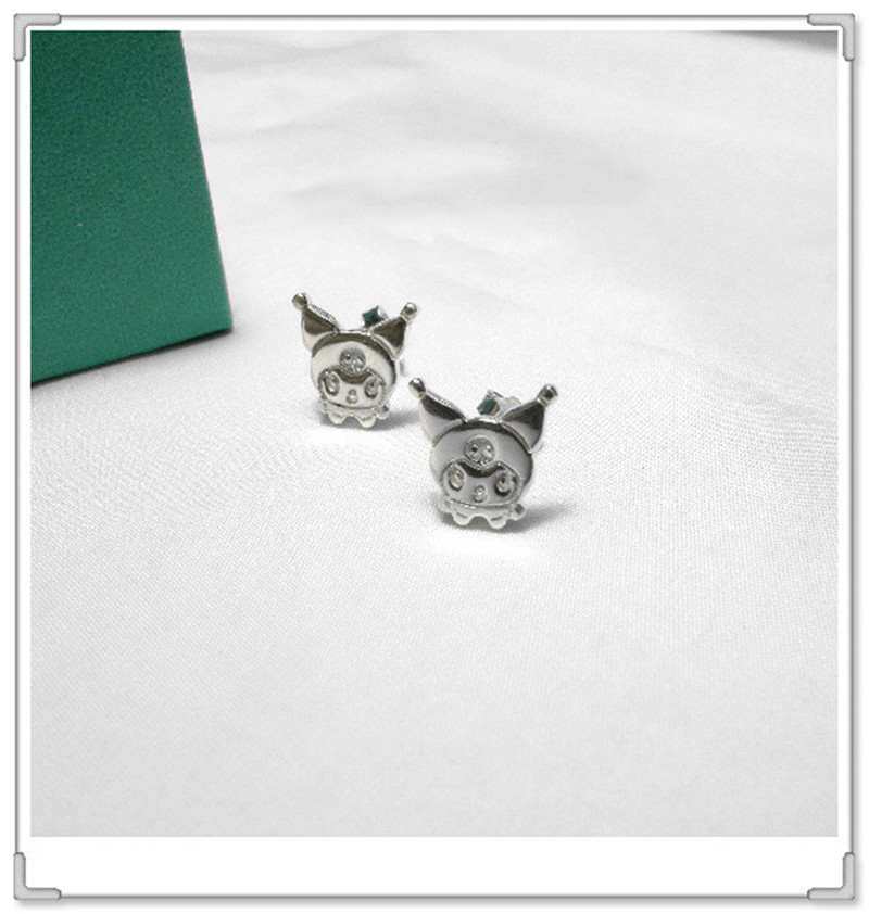 A Pair Of 925 Sterling Silver Earrings With Sterling Silver Earrings