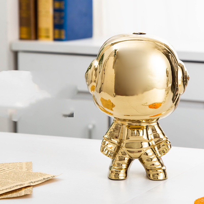 The golden astronaut has a hol