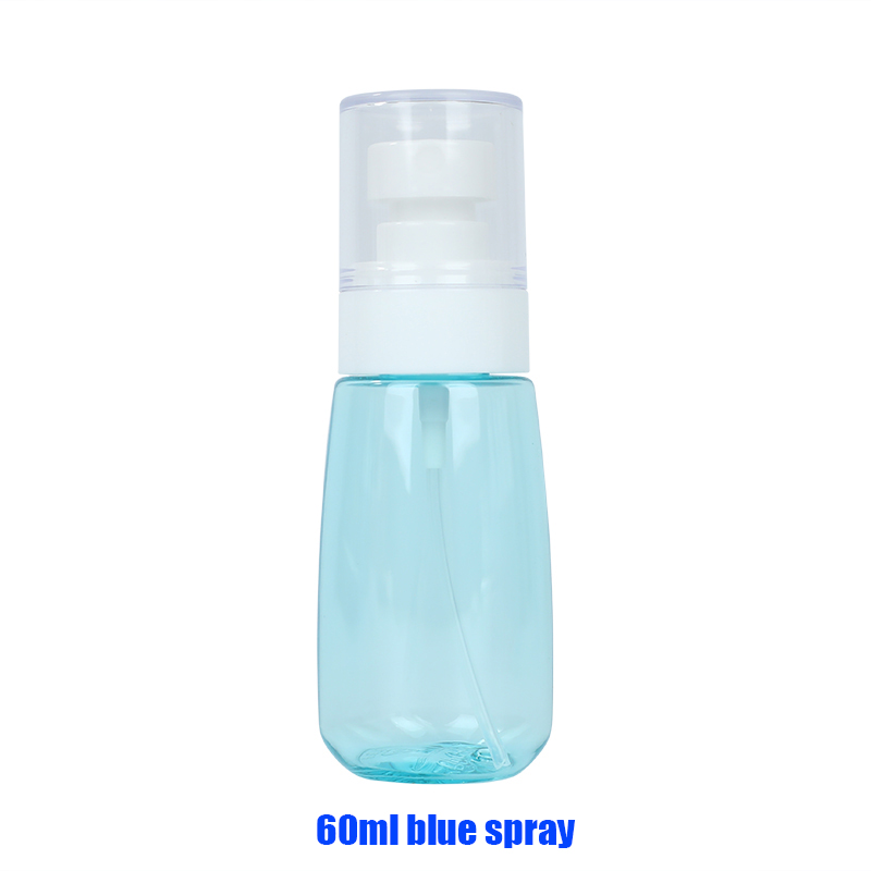 Transparent blue spray bottle