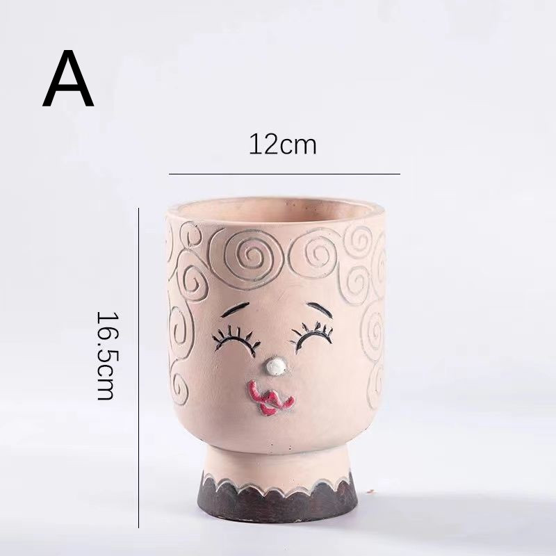 Pink Cement Succulent Pot with smiling face and size details.