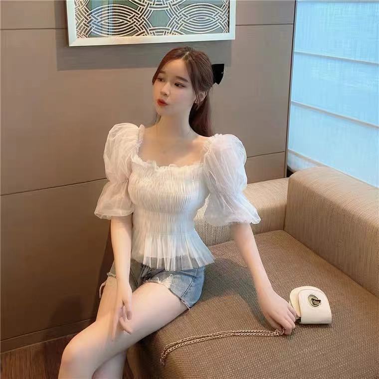 A Silky Top With A Slim Waist And A Square Neckline