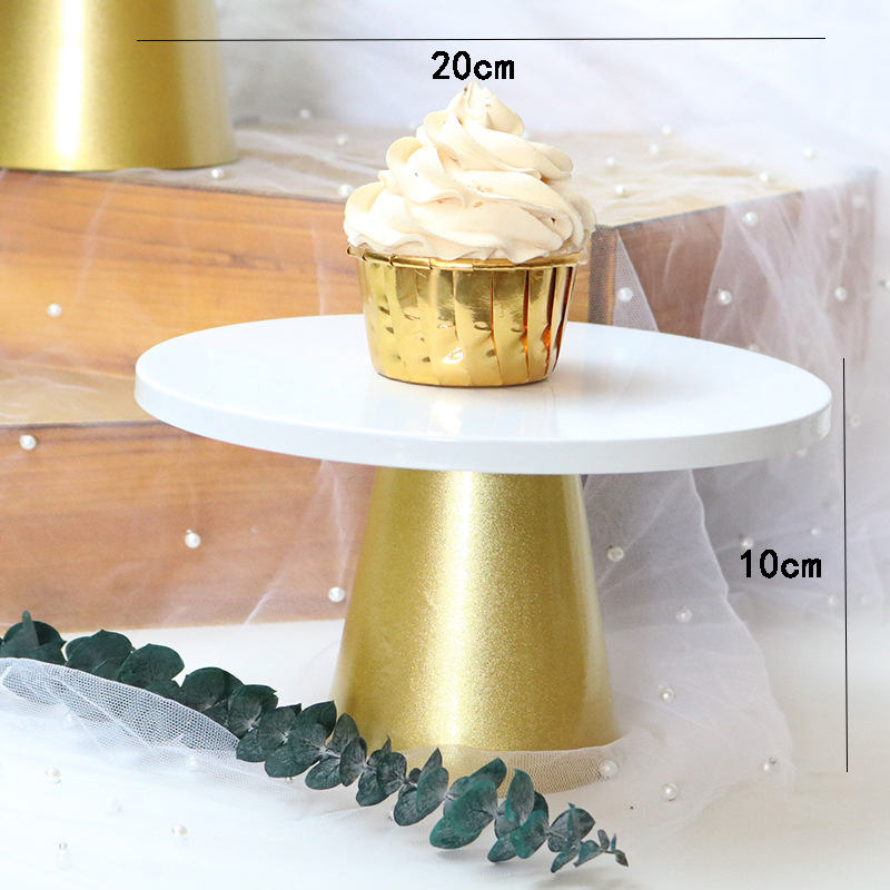 Gold cake stand trumpet