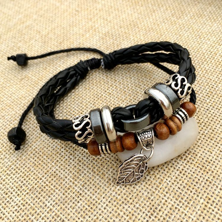 Title 7, Cross stud braided leather bracelet a stylish a...