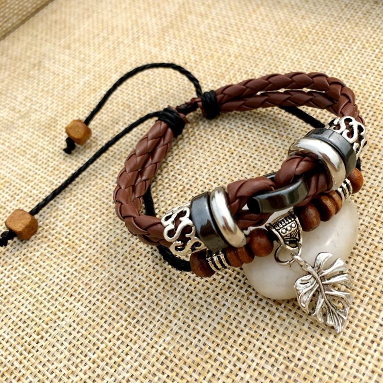 Title 5, Cross stud braided leather bracelet a stylish a...