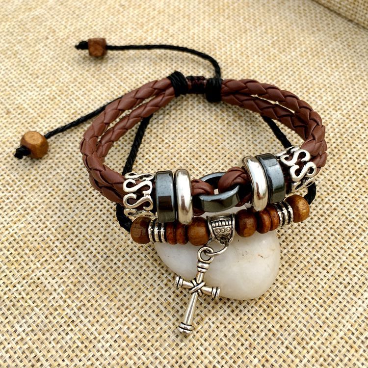 Title 3, Cross stud braided leather bracelet a stylish a...