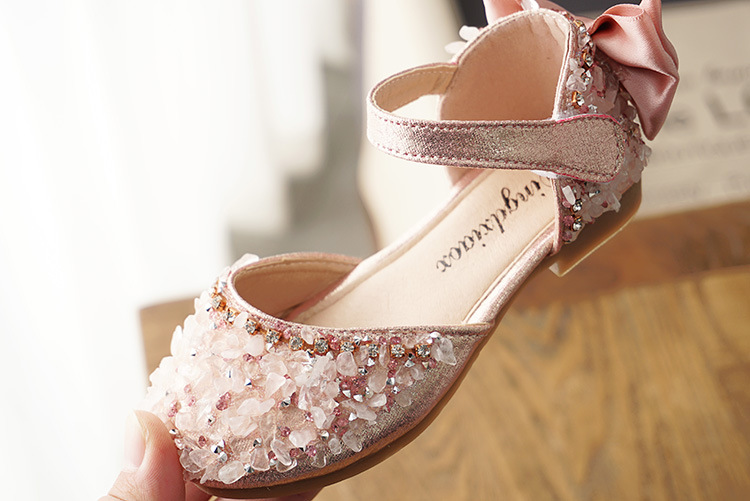 Title 6, Girls sandals with rhinestone accents and a so...