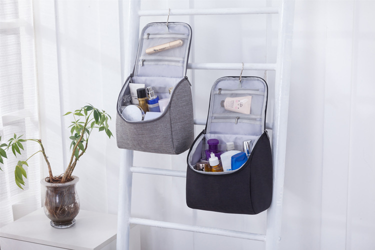 Title 2, Hanging travel storage bag with multiple compar...