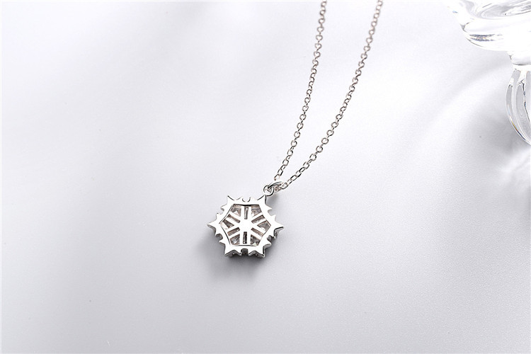 Title 3, Dazzling snowflake necklace for a winter sparkl...