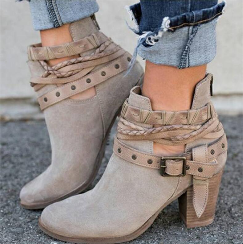 Title 17, High-Heeled Martin Boots with rivet belt buckle...