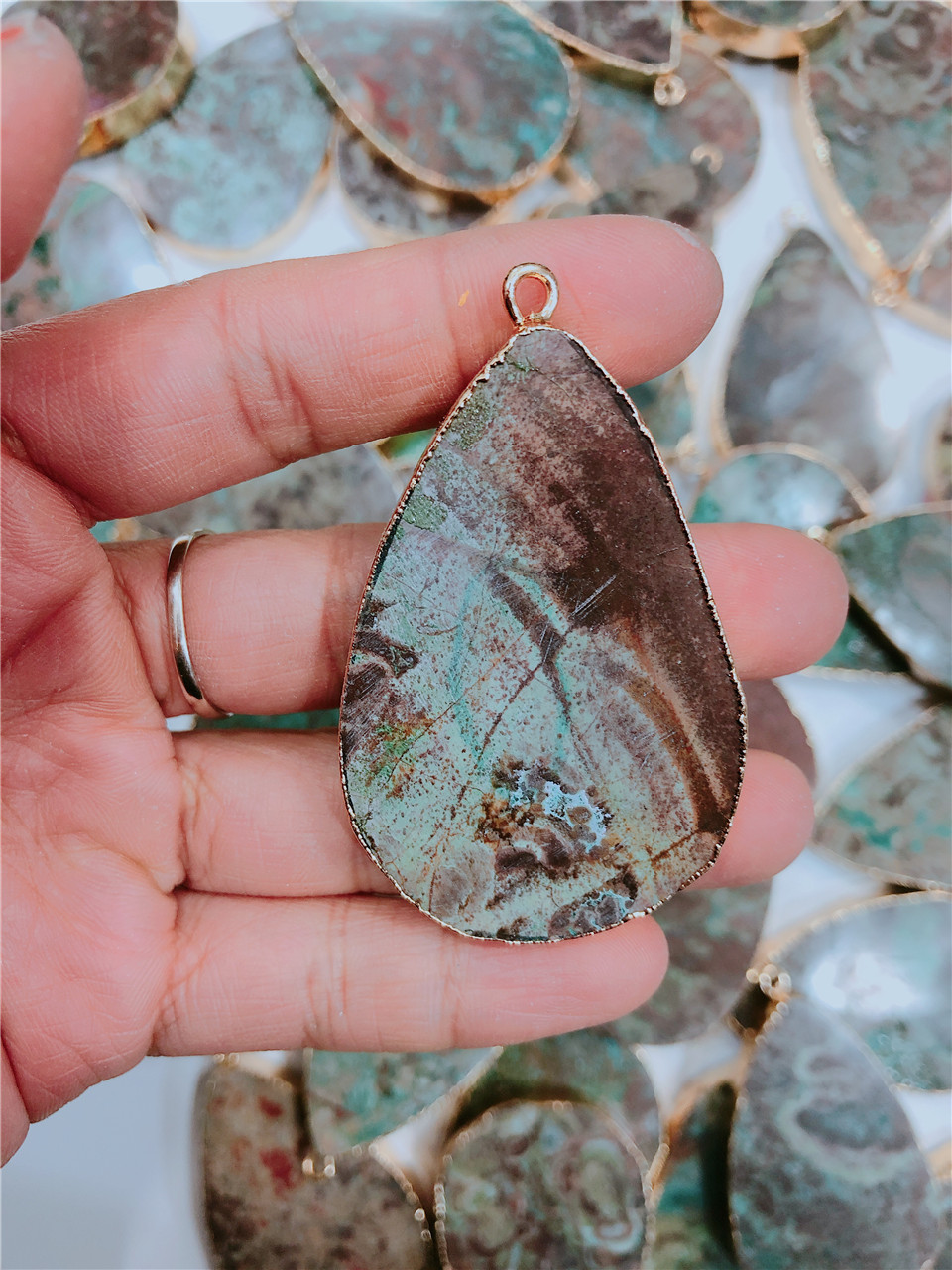 Title 10, Natural marine stone pendant