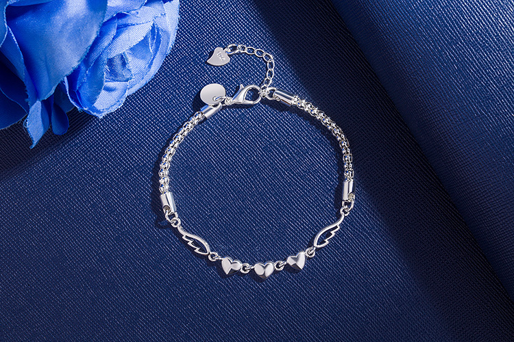 Title 10, Peach Heart Angel Wing Bracelet