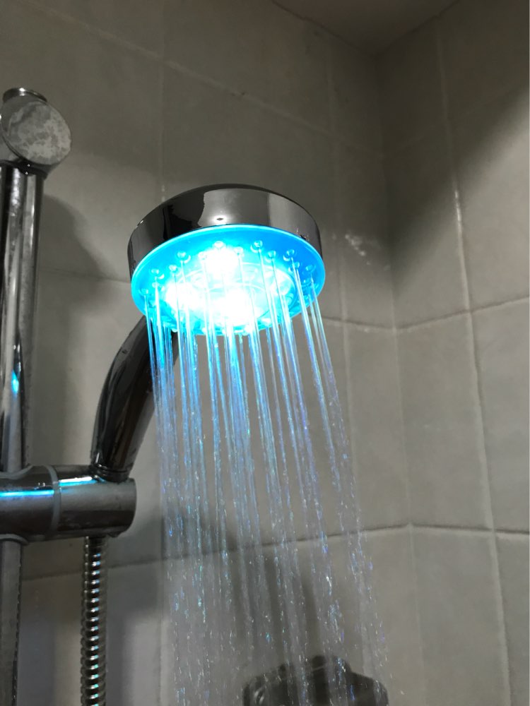 Title 1, LED color changing showerhead provides a vibran...