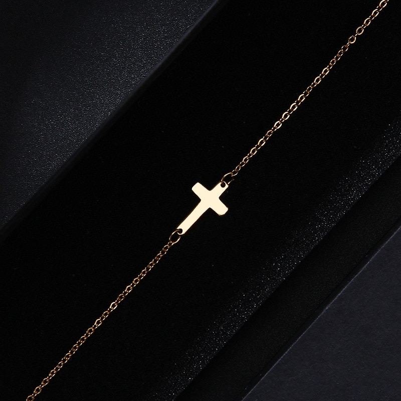 Title 10, Cross bracelet