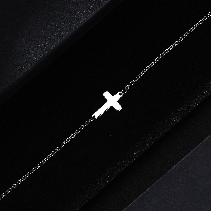 Title 11, Cross bracelet