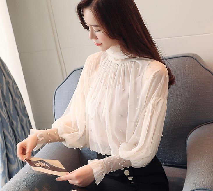 Title 3, Womens Lantern Sleeve Mesh Chiffon Shirt. A st...