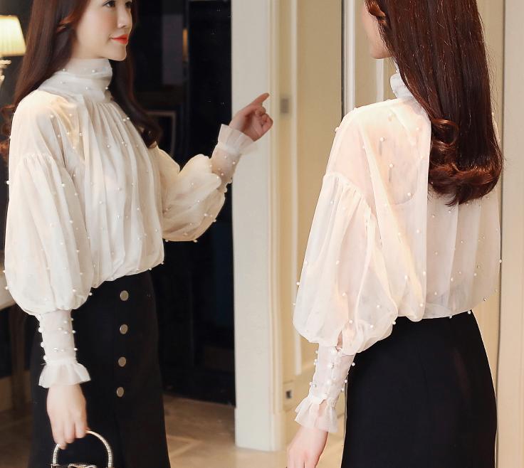 Title 4, Womens Lantern Sleeve Mesh Chiffon Shirt. A st...