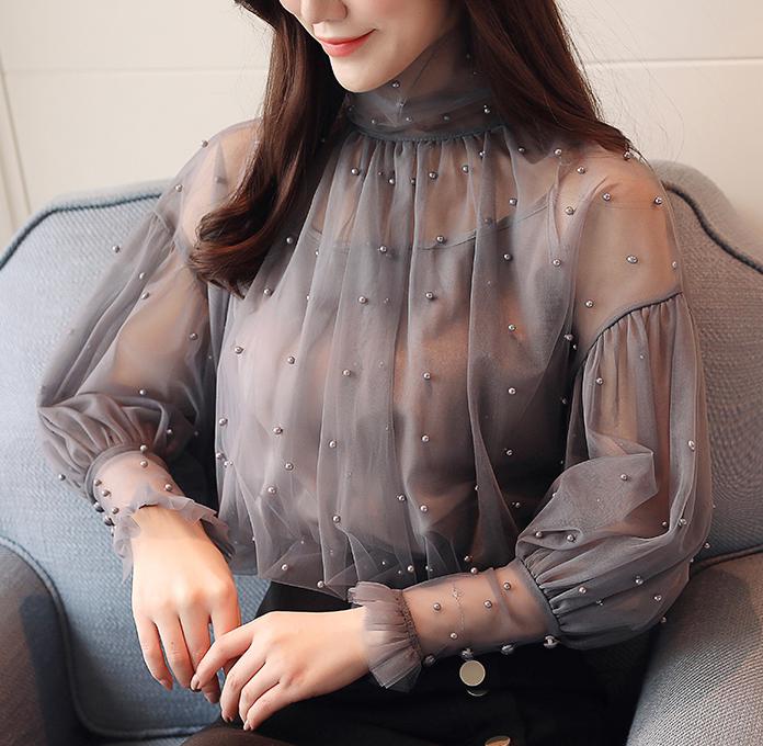 Title 7, Womens Lantern Sleeve Mesh Chiffon Shirt. A st...