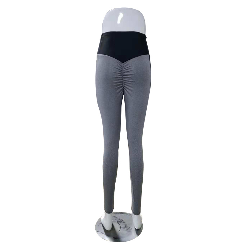 Title 2, Yoga Leggings mit schwarzen und grauen Nähten. ...