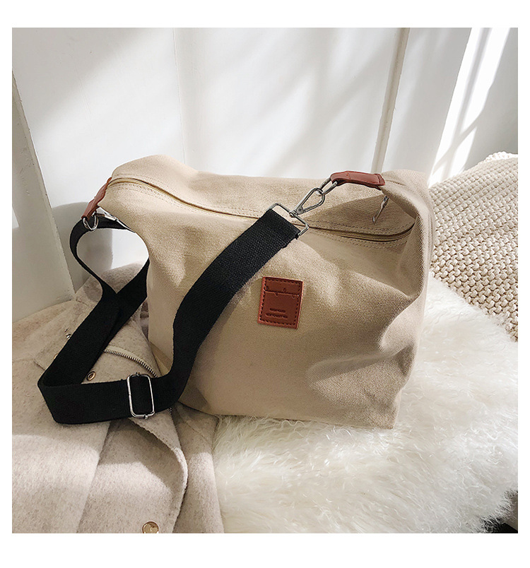 Title 2, Canvas Broadband Shoulder Bag