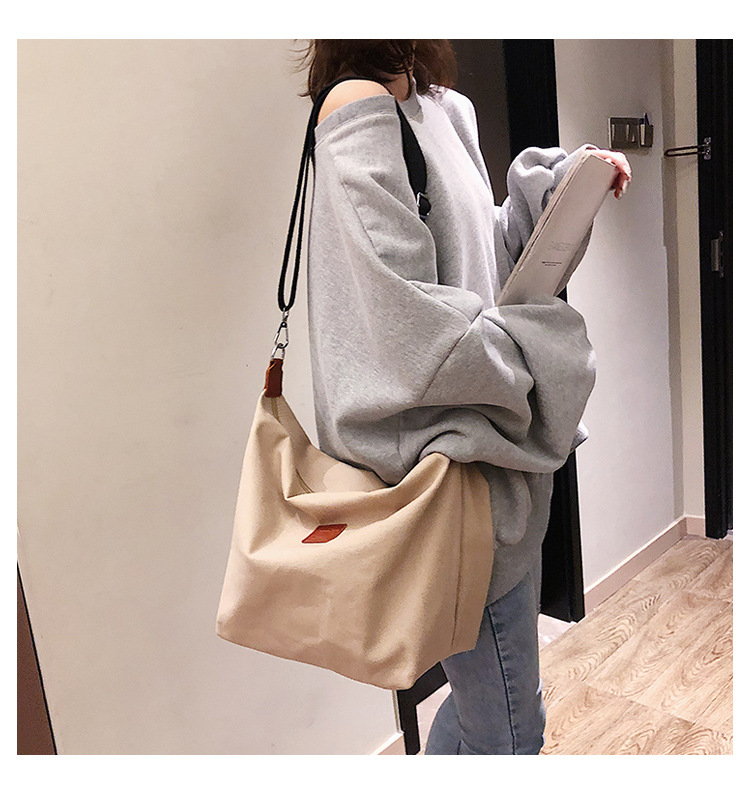 Title 30, Canvas Broadband Shoulder Bag