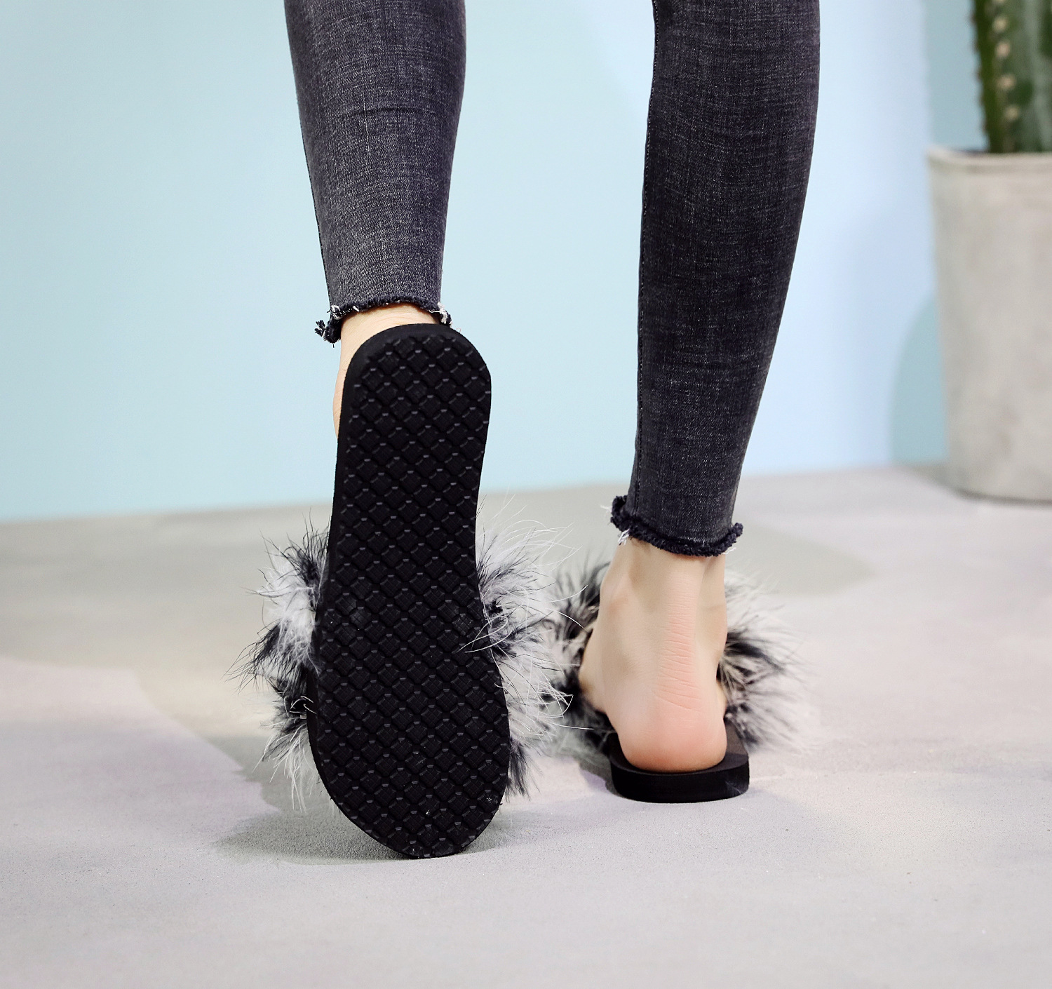 Title 19, Ostrich wollen platte slippers voor ultiem comf...