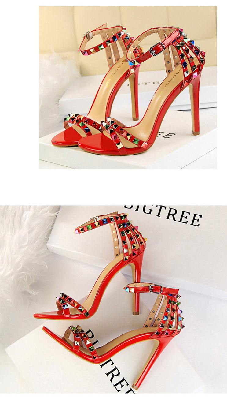 Title 6, Open-toe sandals with cutout colorful studs. St...