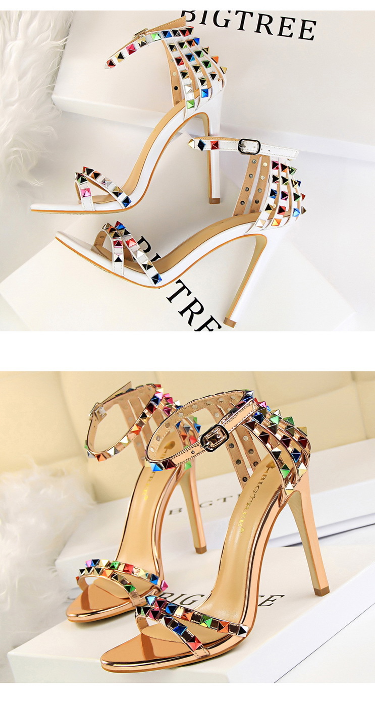 Title 9, Open-toe sandals with cutout colorful studs. St...