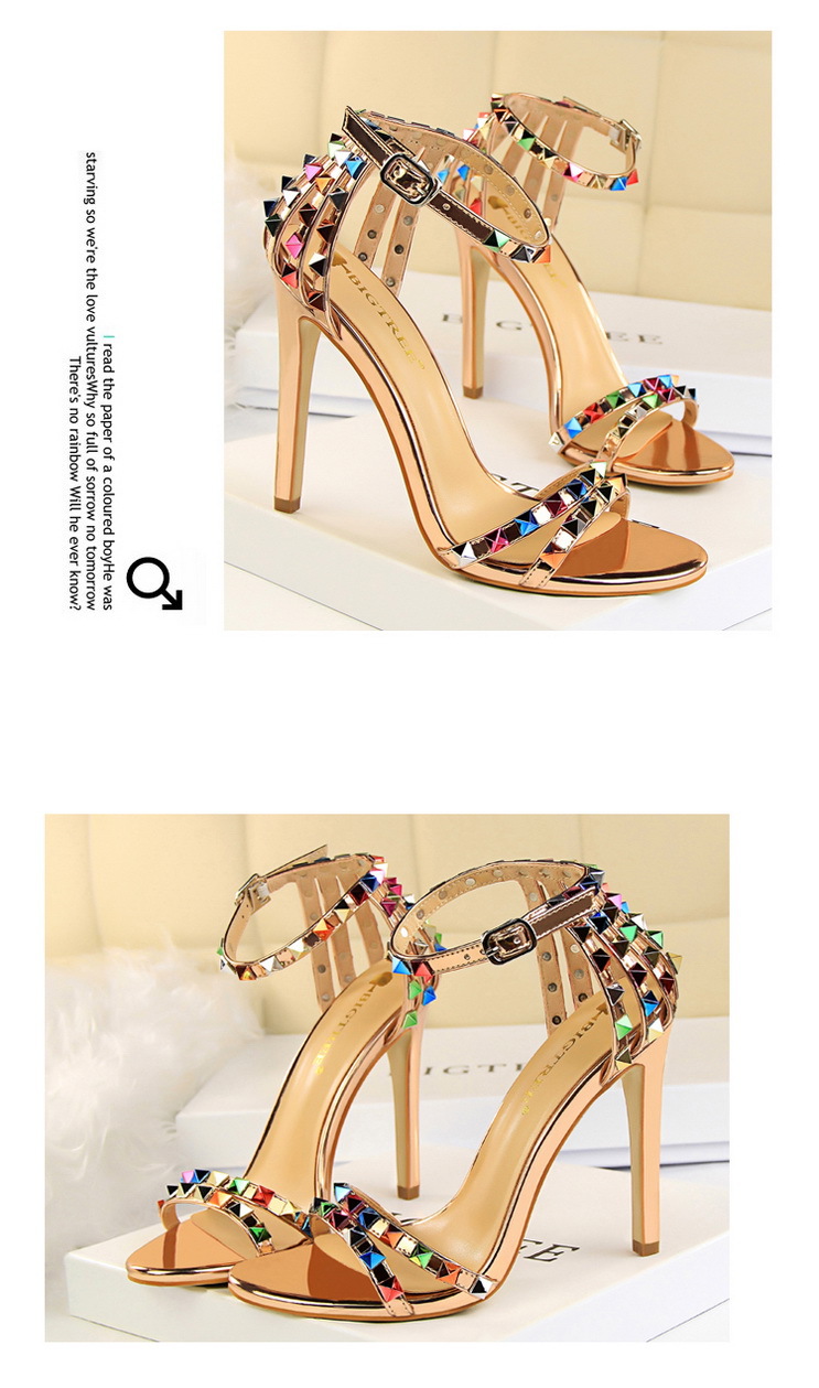 Title 10, Open-toe sandals with cutout colorful studs. St...