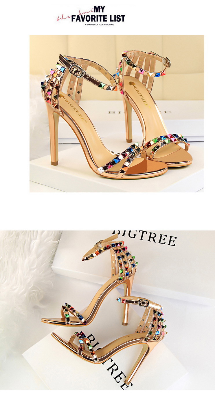 Title 11, Open-toe sandals with cutout colorful studs. St...