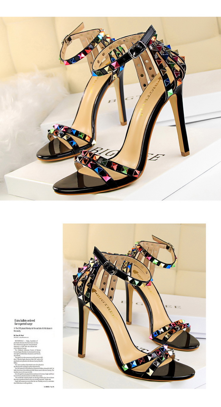 Title 12, Open-toe sandals with cutout colorful studs. St...